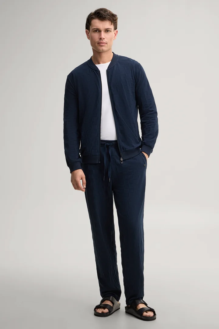 Leads to product detail page "Dark blue loungewear trousers"