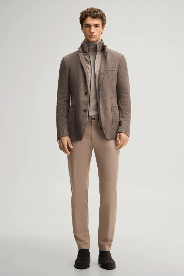 Leads to product detail page "Light brown suit jacket with a stand-up collar"