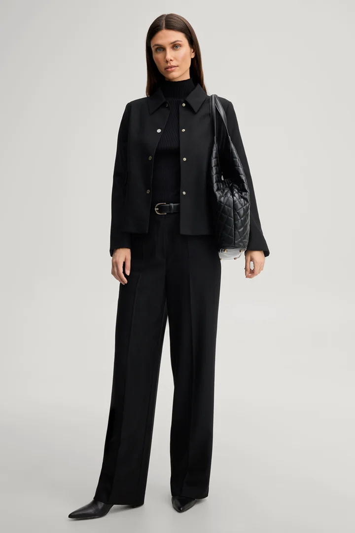 Leads to product detail page "Marlene trousers in black"