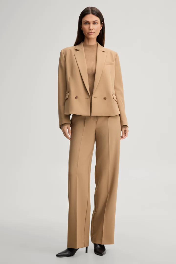 Leads to product detail page "Double-breasted blazer in camel"