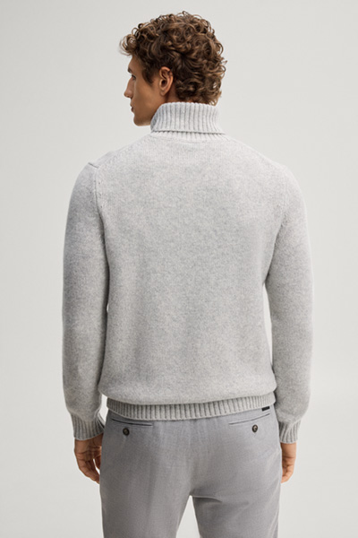 Leads to product detail page "Light grey woollen turtleneck jumper"