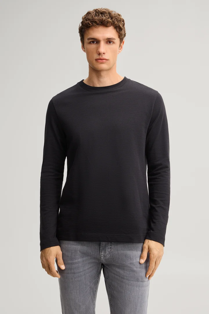 Leads to product detail page "Black cotton longsleeve top"