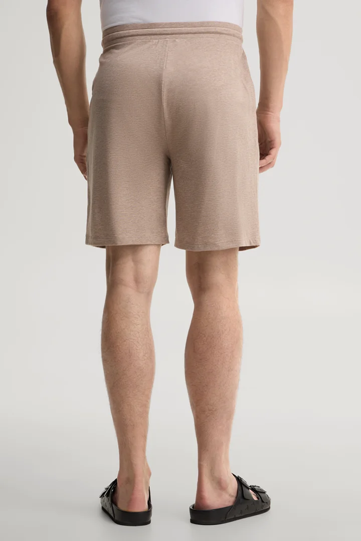 Leads to product detail page "Beige loungewear shorts"