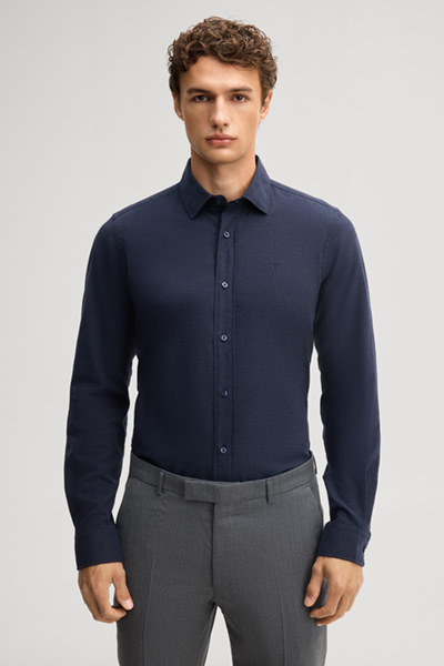 Leads to product detail page "Navy cotton shirt"