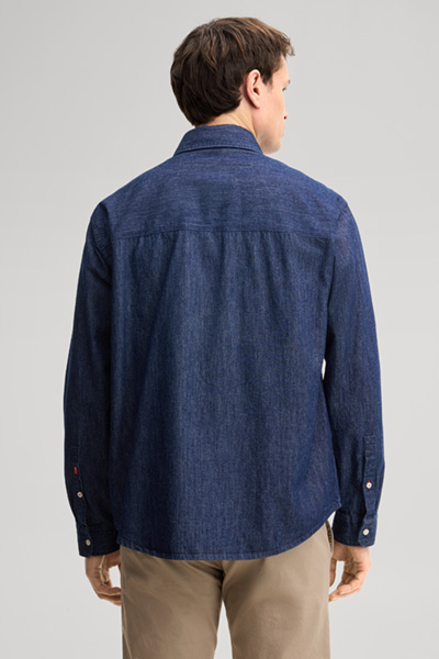 Leads to product detail page "Dark blue denim shirt"