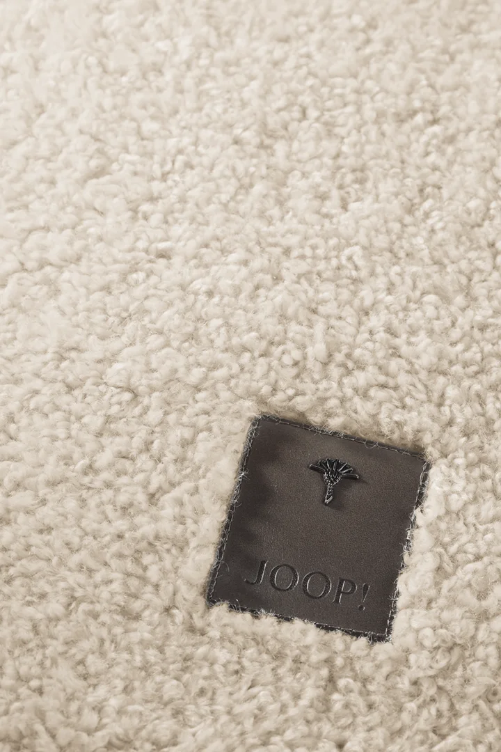 Leads to product detail page "JOOP! curly decorative cushion cover"