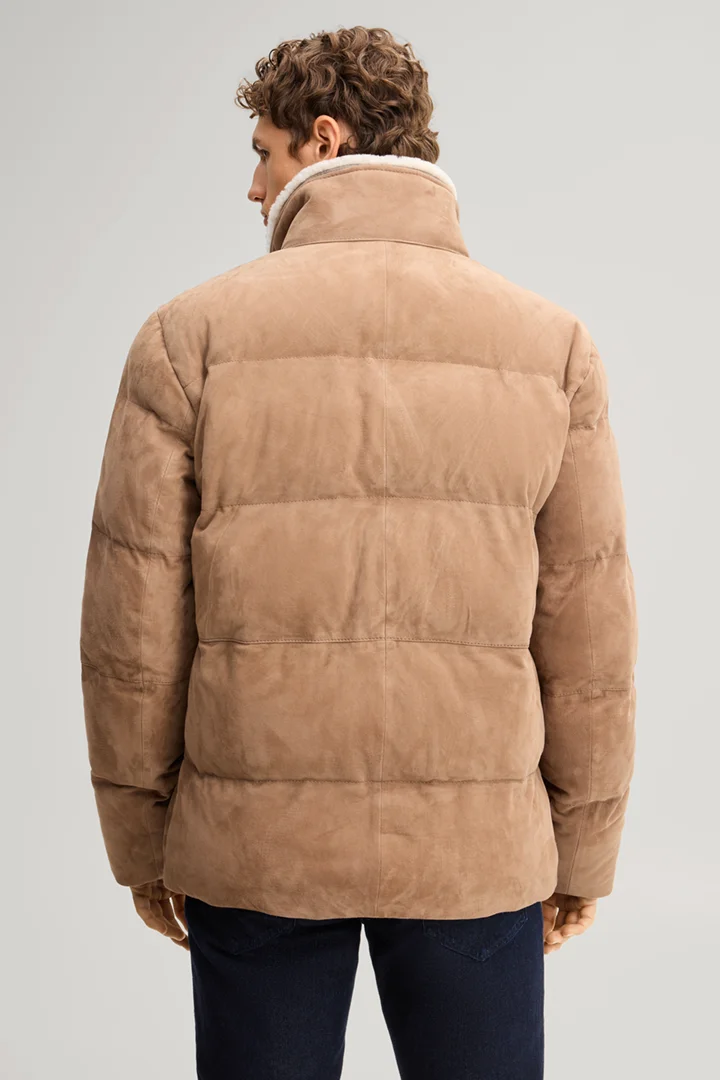 Leads to product detail page "Beige suede jacket"