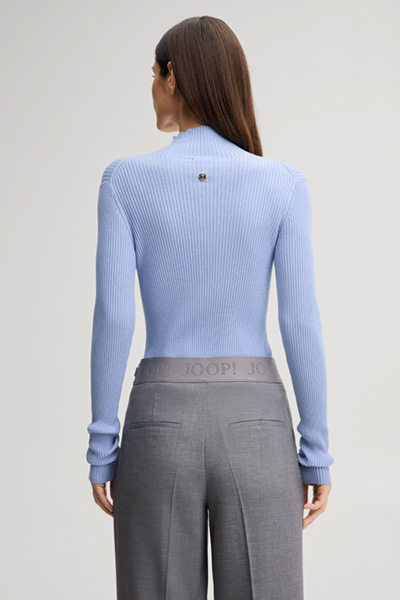 Leads to product detail page "Light blue viscose-blend jumper with a stand-up collar"