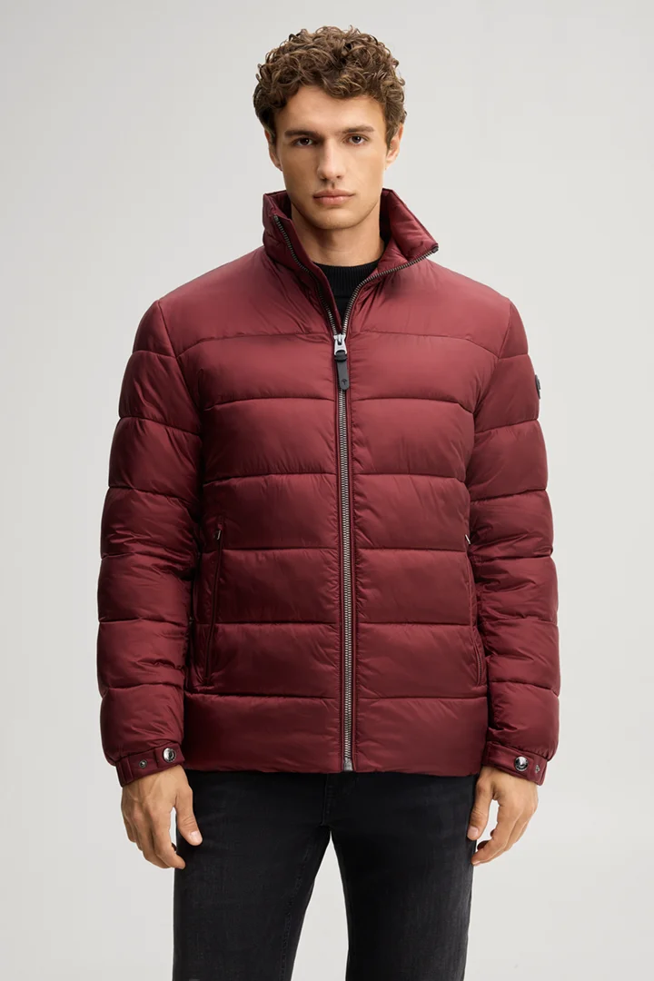 Leads to product detail page "Quilted jacket with a stand-up collar in burgundy"