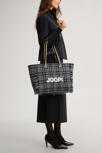 Leads to product detail page "Milano lysann shopper in black and white chequered"