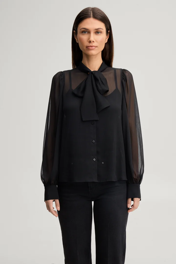 Leads to product detail page "Black chiffon bow tie blouse"