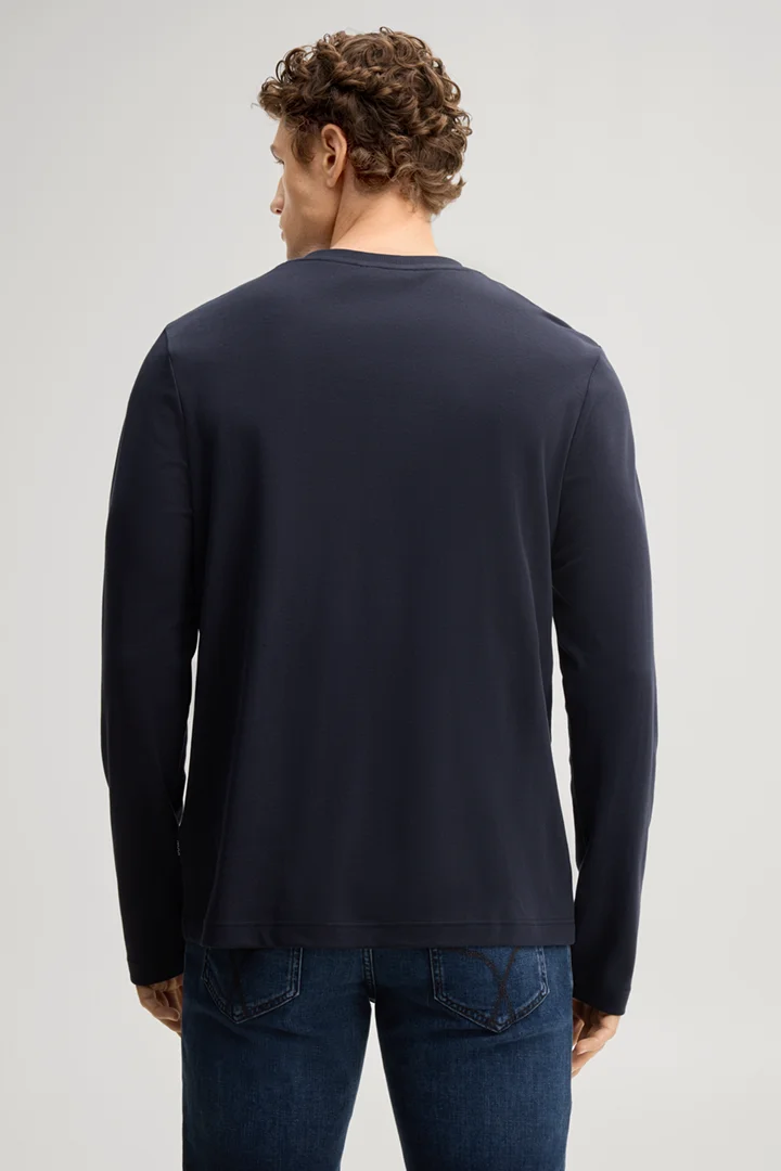 Leads to product detail page "Navy cotton longsleeve top"