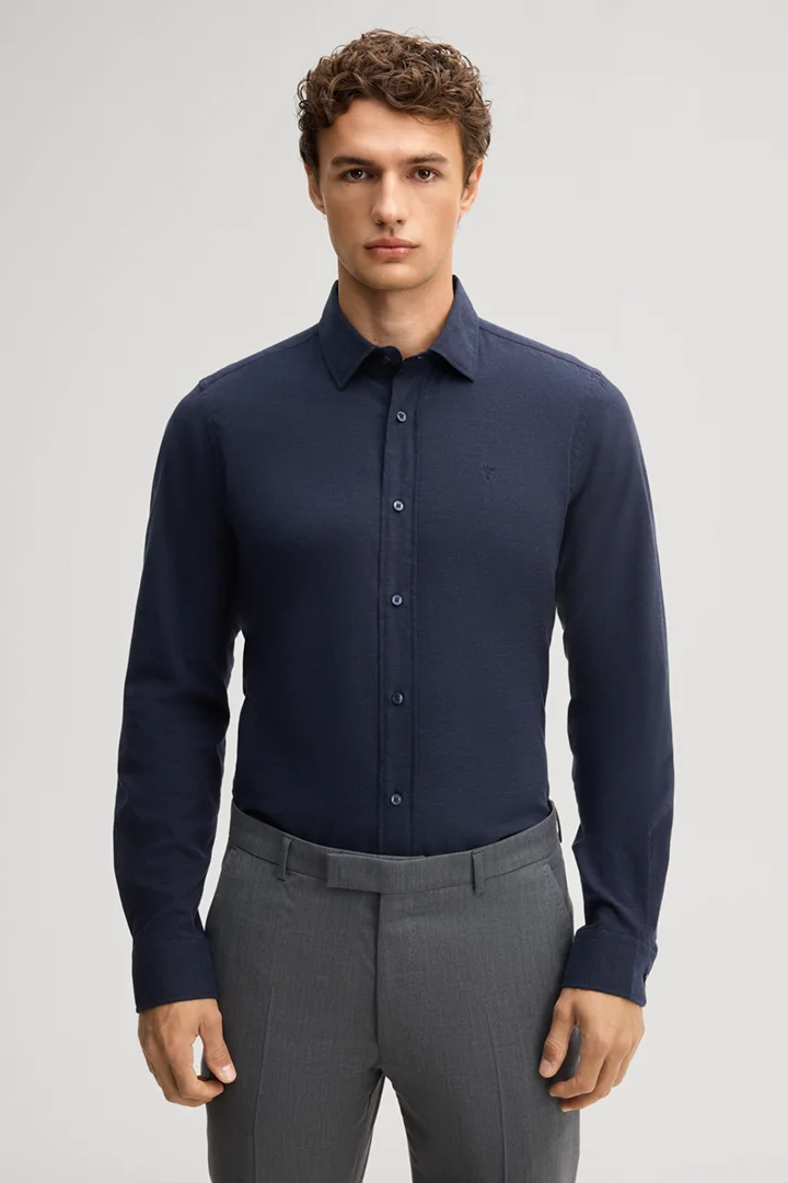 Leads to product detail page "Navy cotton shirt"