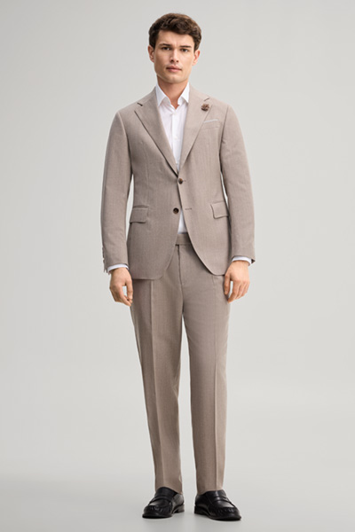 Leads to product detail page "Modular suit jacket in virgin wool, in light beige"
