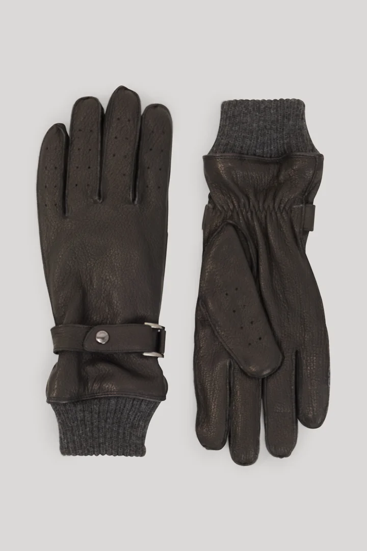 Führt zu Produktdetailseite „Lederhandschuhe in Schwarz"