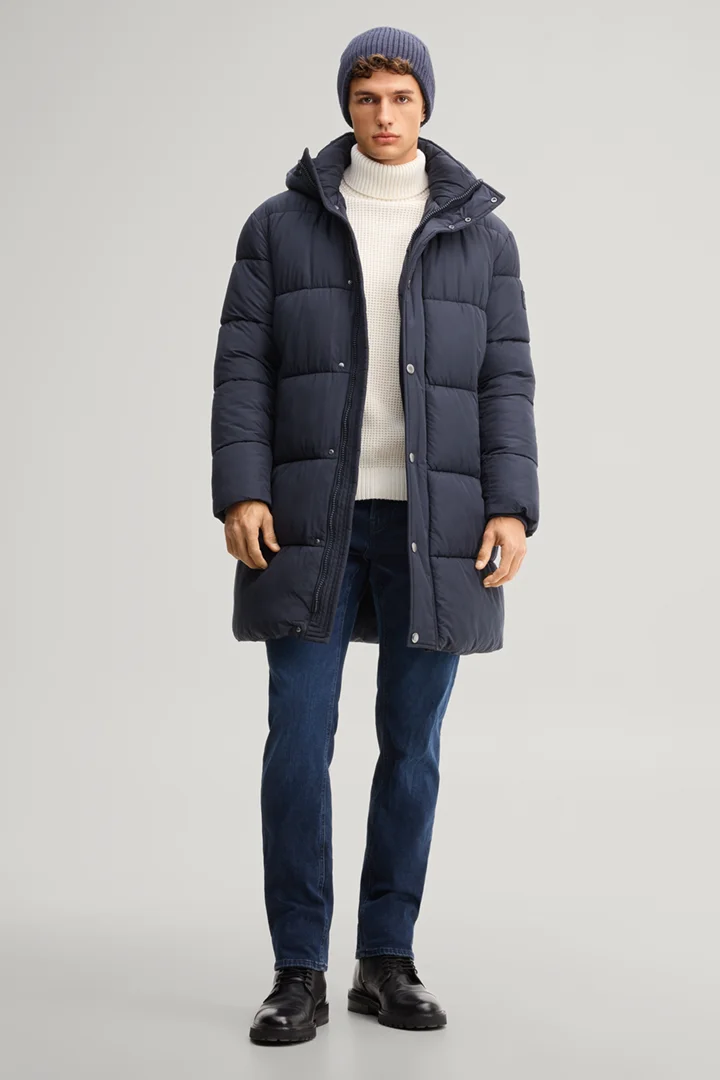 Leads to product detail page "Navy hooded parka"