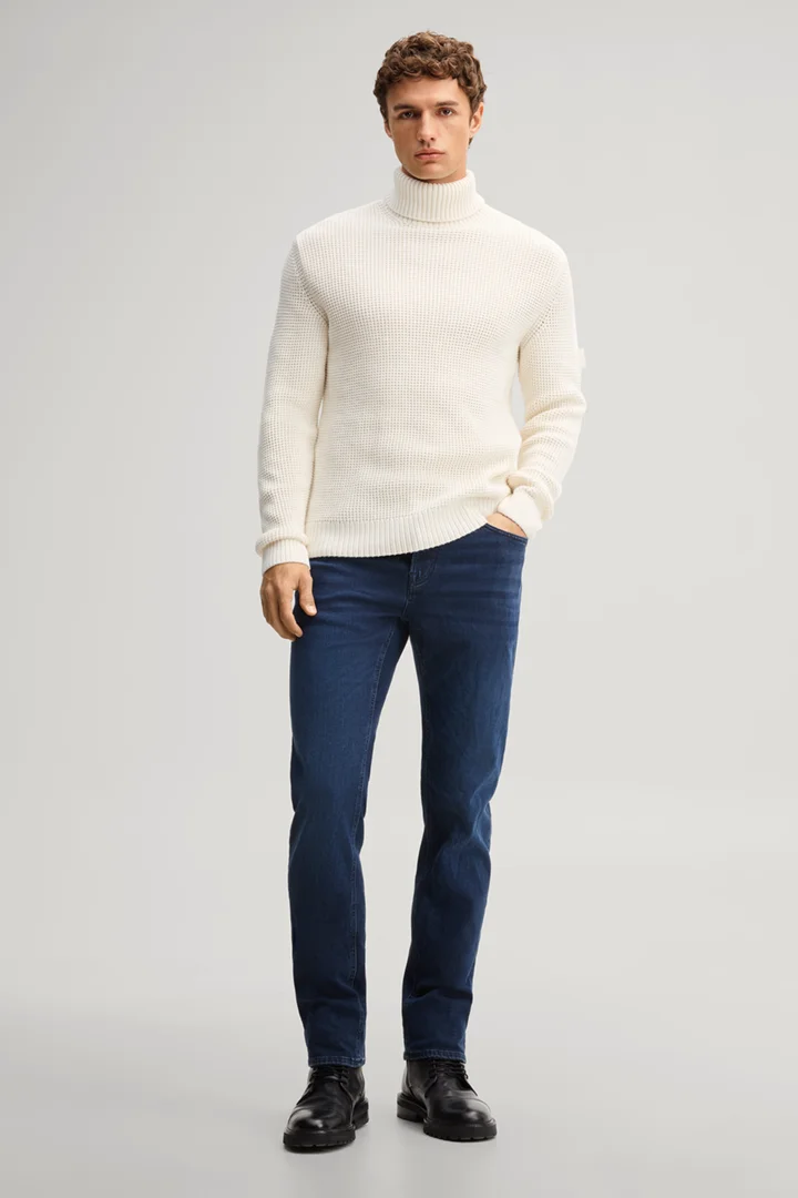 Leads to product detail page "Beige turtleneck jumper"