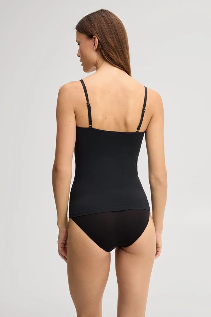 Leads to product detail page "Black loungewear top"