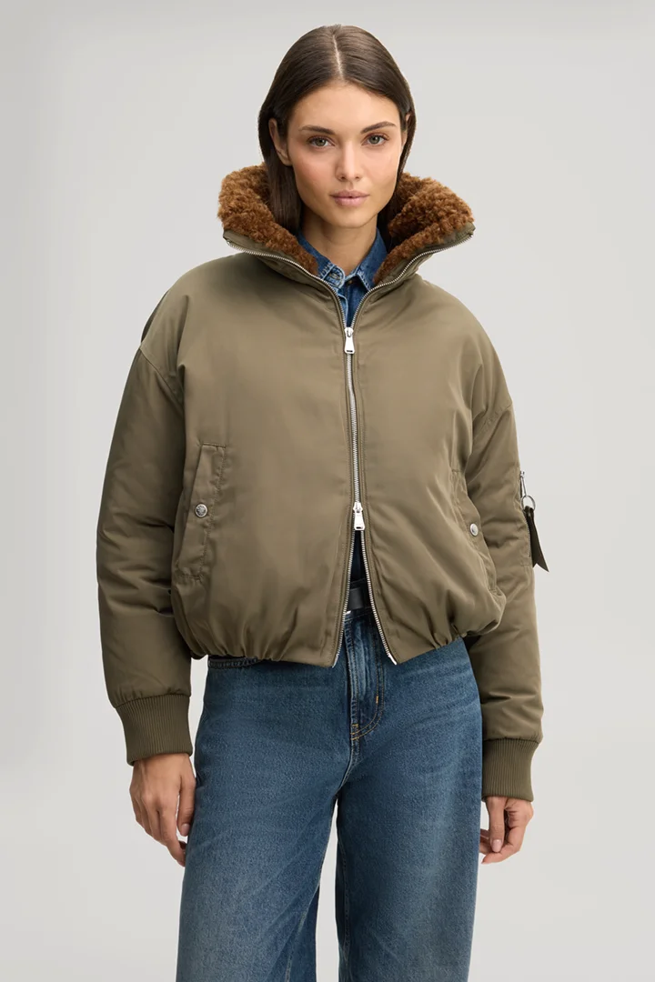 Leads to product detail page "Aviator jacket with teddy collar in olive"