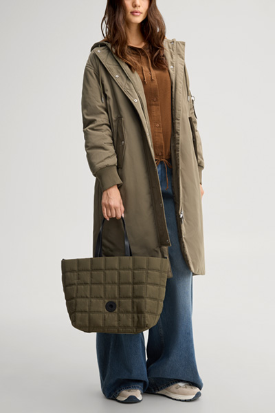 Leads to product detail page "Facilita Pam handbag in olive green, quilted"