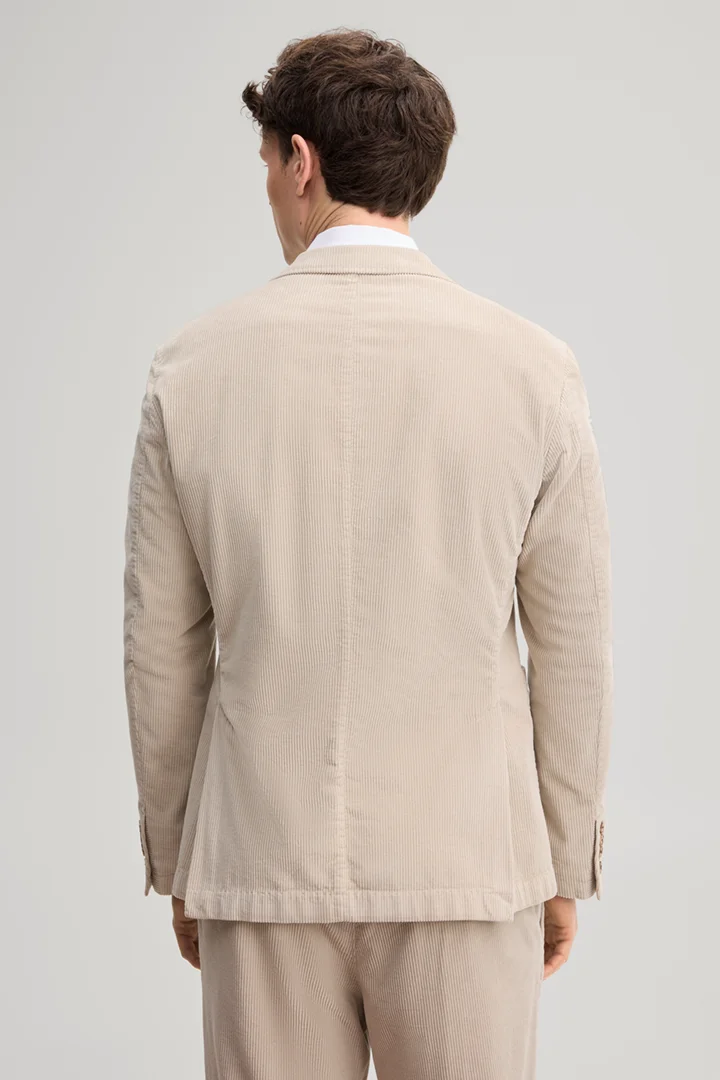 Leads to product detail page "Light beige corduroy suit jacket"