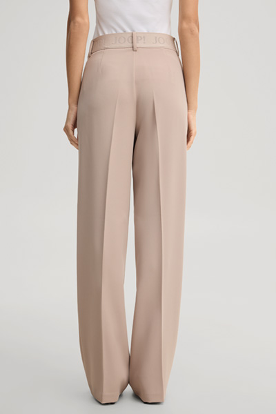 Leads to product detail page "Travel marlene trousers in beige"