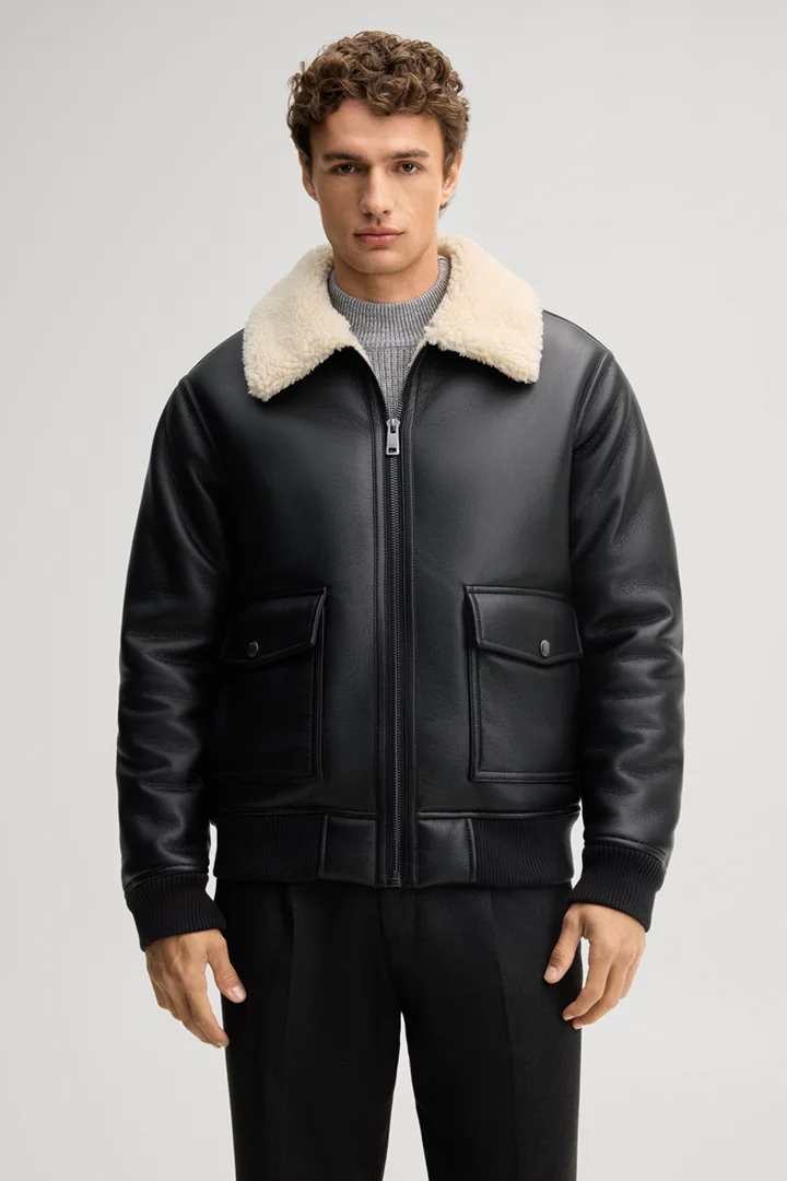Leads to product detail page "Black vegan leather blouson"