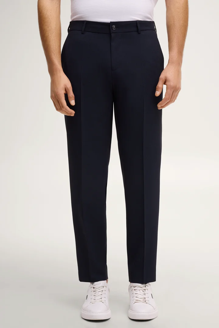 Leads to product detail page "River suit trousers in navy"