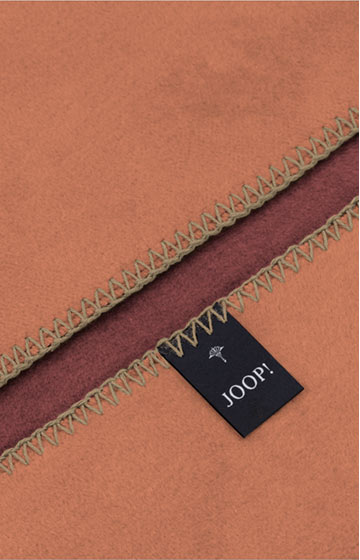 JOOP! UNI-DOUBLEFACE Blanket in Garnet/Copper