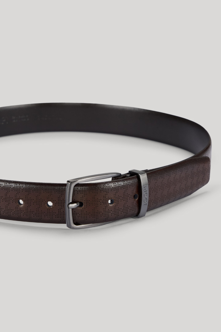 Leads to product detail page "Perforated Leather Belt in Dark Brown"