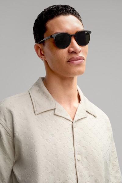 Führt zu Produktdetailseite „Sonnenbrille in Grün/Braun"