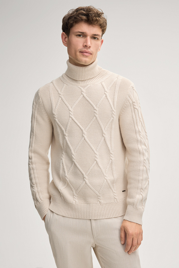 Leads to product detail page "Liono Turtleneck Sweater in Cream"