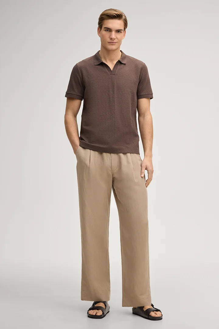 Führt zu Produktdetailseite „Poloshirt Pono in Dunkelbraun"