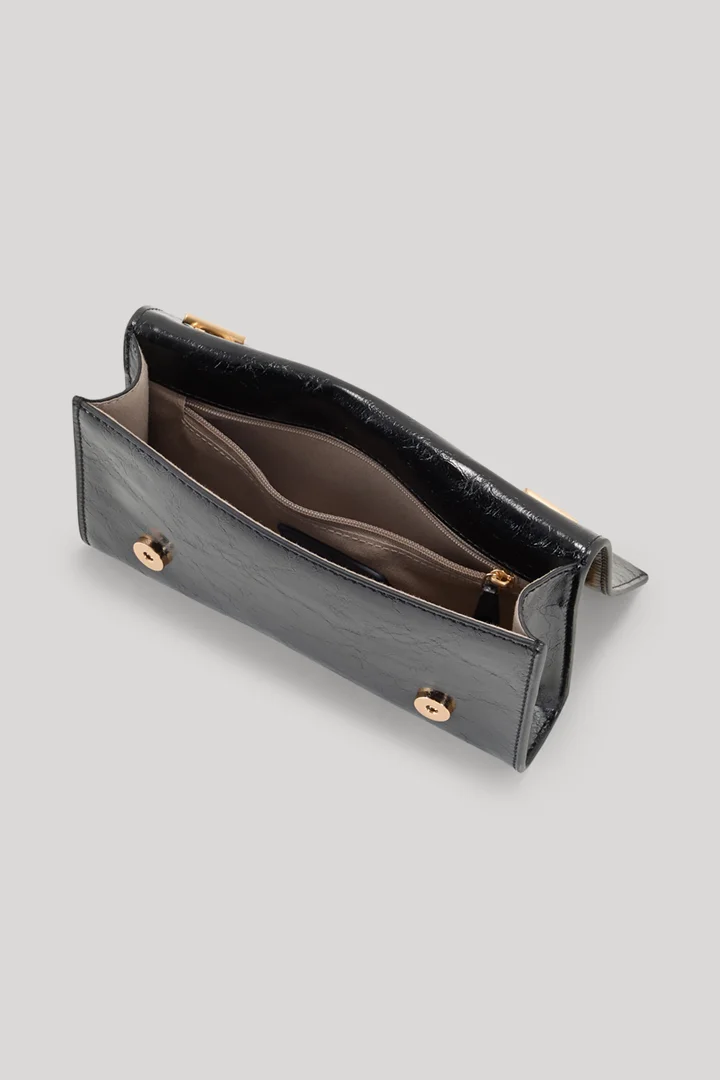 Leads to product detail page "Scala adina clutch in black"