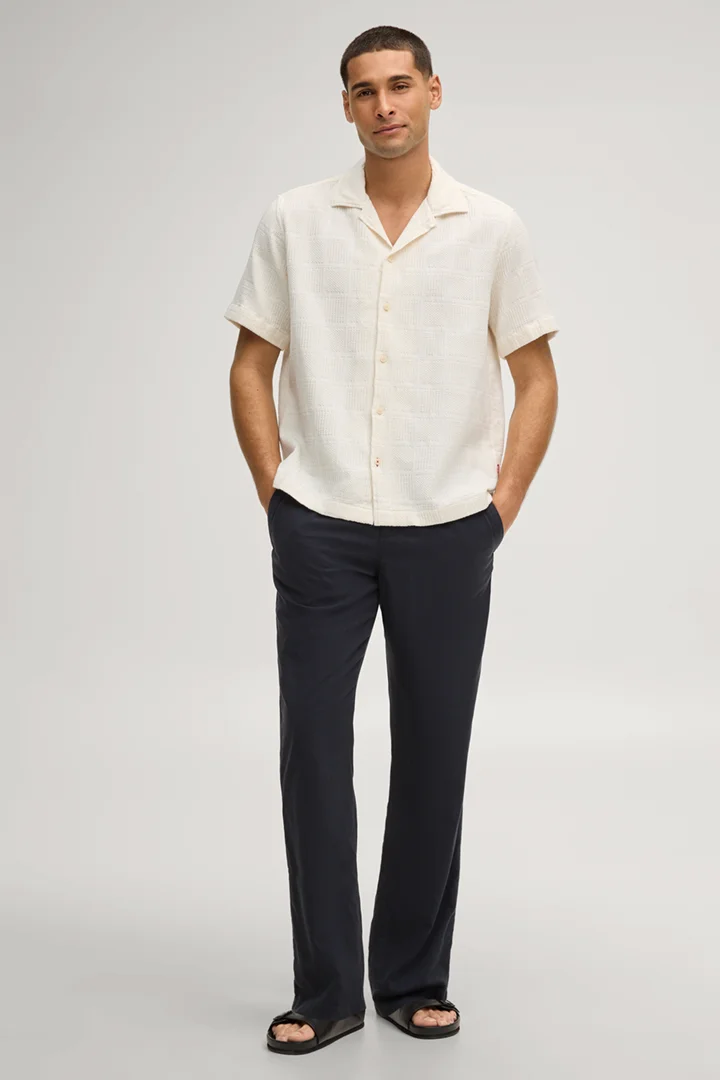 Leads to product detail page "Russell jogging bottoms in navy"