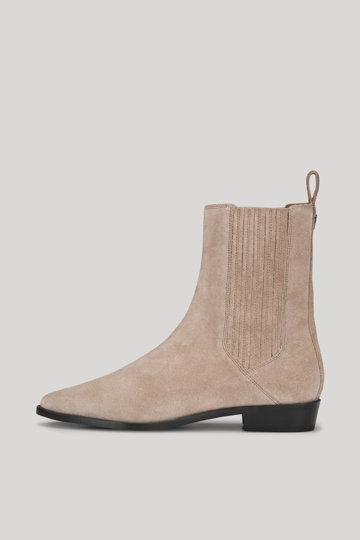 Leads to product detail page "Velluto Lou Ankle Boots in Beige"