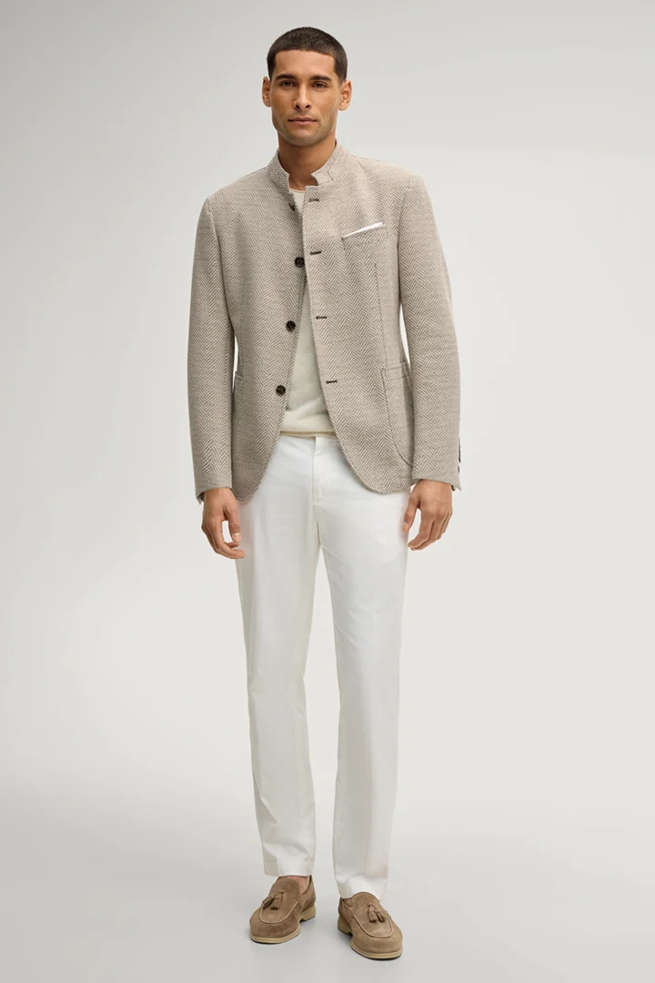 Leads to product detail page "Hiro jacket in brown patterned fabric"