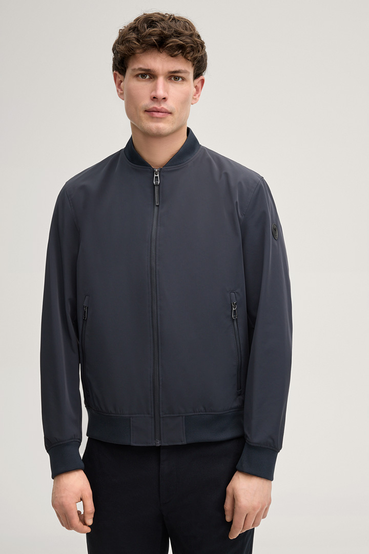 Leads to product detail page "Carlos Blouson in Navy"