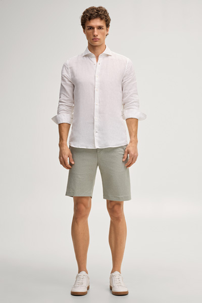 Leads to product detail page "Green Jersey Chino Capri Shorts"