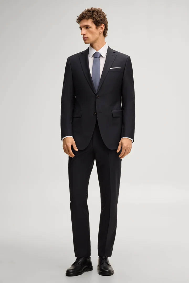 Prowadzi do strony produktu „Modułowe spodnie do garnituru Brad w kolorze granatowym"