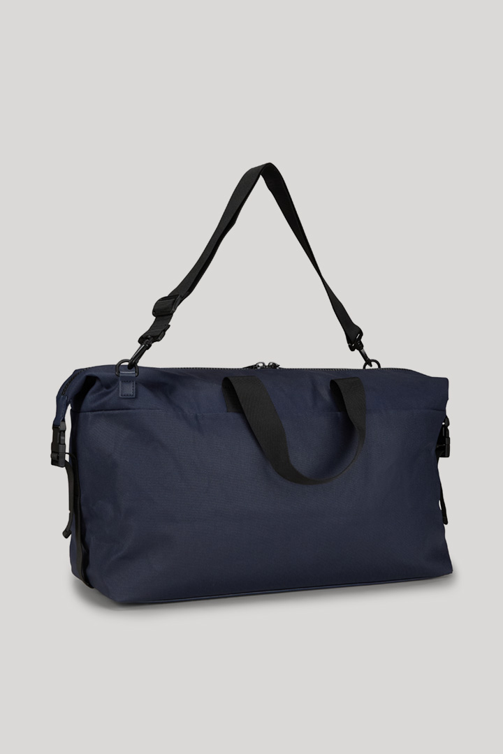 Leads to product detail page "Buccino Maik Weekender in Navy"