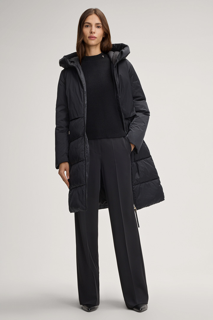 Leads to product detail page "Carmen Quilted Coat in Black"