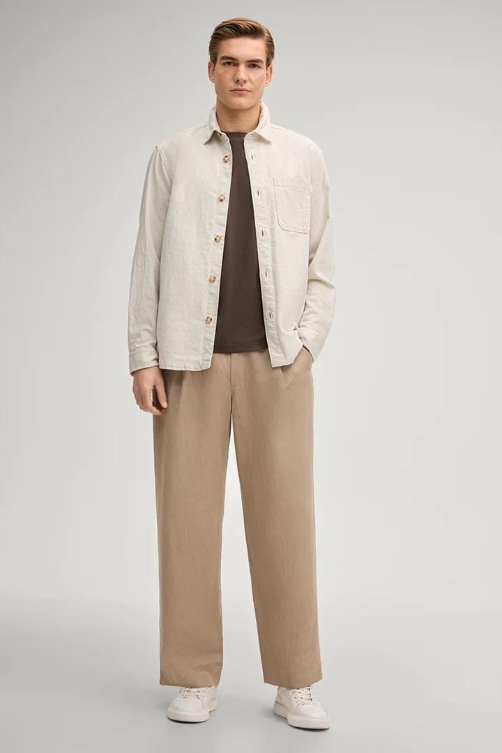 Leads to product detail page "Priamo T-shirt in dark brown"