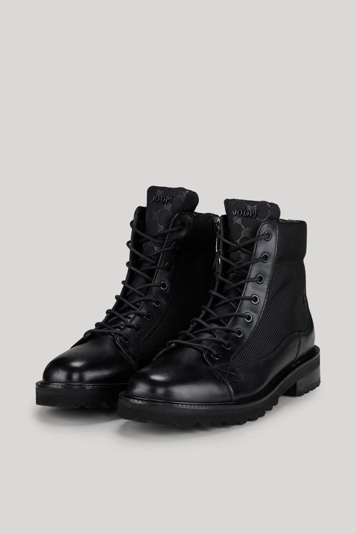 Führt zu Produktdetailseite „Boots Tela Mario in Schwarz"