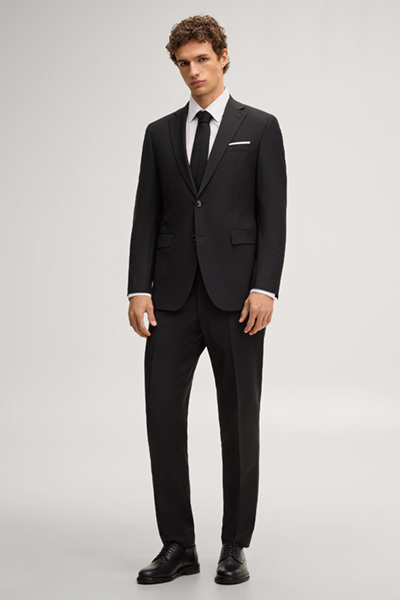 Leads to product detail page "Brad Modular Suit Trousers in Black"