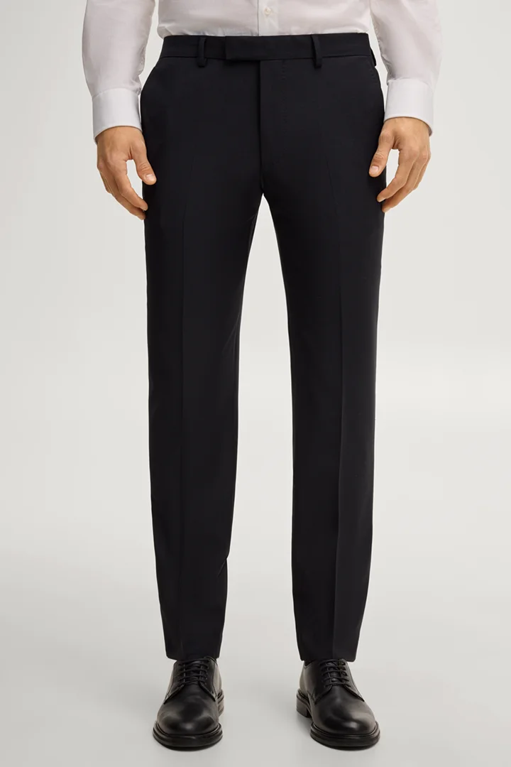 Prowadzi do strony produktu „Modułowe spodnie do garnituru Brad w kolorze granatowym"