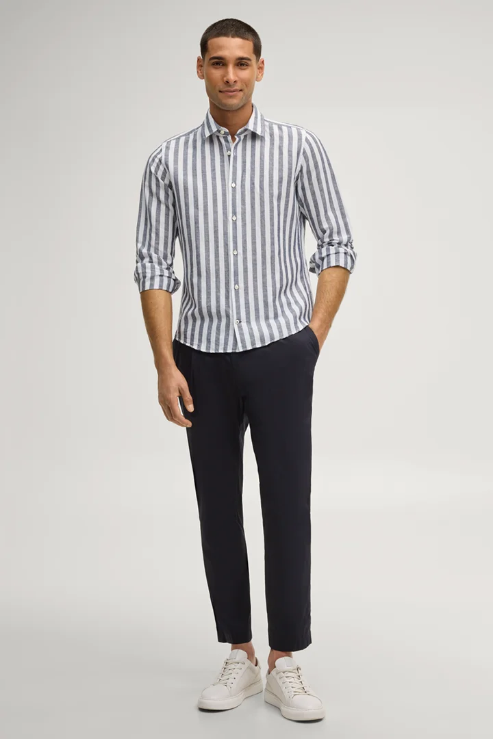 Leads to product detail page "Pit shirt in navy stripes"