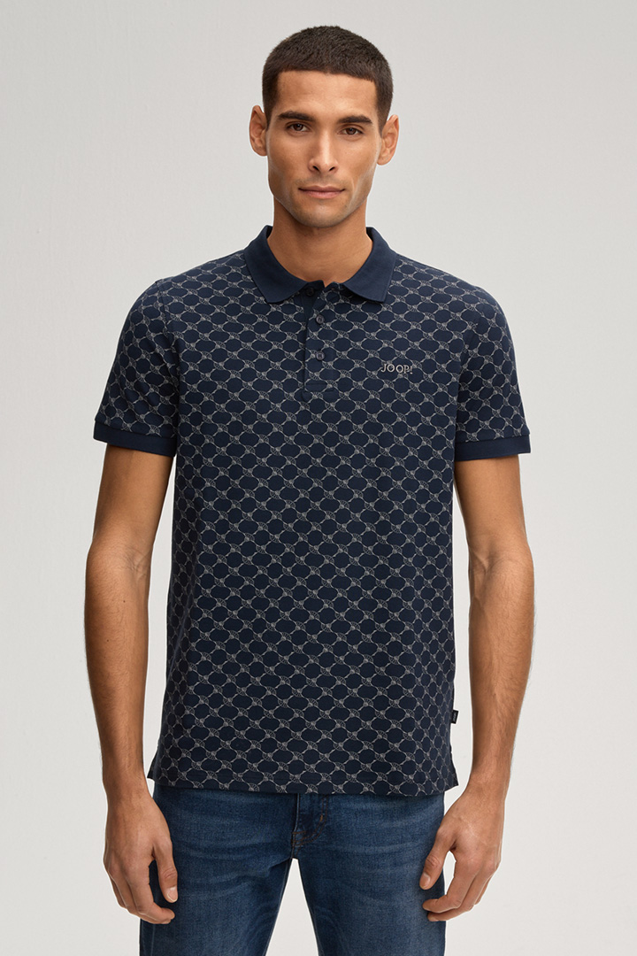 Leads to product detail page "Paigam Cornflower Polo Shirt in a Navy Pattern"