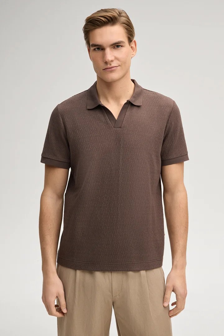 Führt zu Produktdetailseite „Poloshirt Pono in Dunkelbraun"