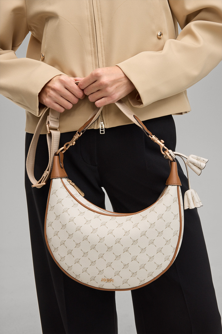 Führt zu Produktdetailseite „Schultertasche Cortina Jennifer in Offwhite gemustert"